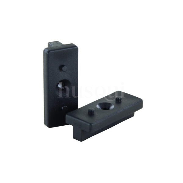 Two black plastic t clips for composite decking