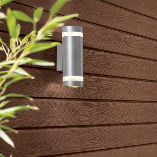 Outside wall clad in brown cladding with wall light